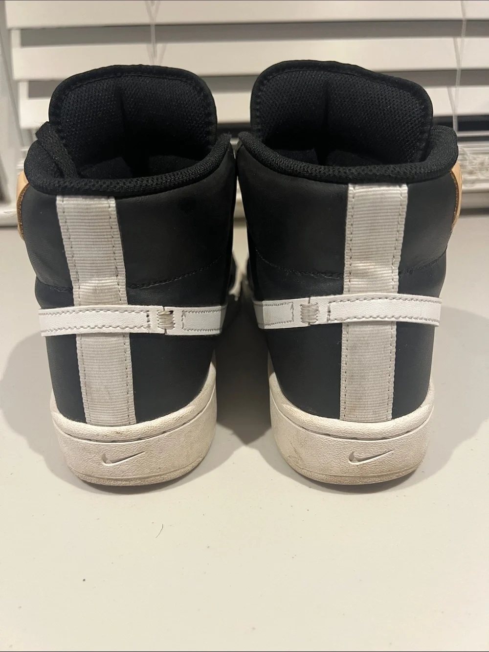 Nike Black High-Top Sneakers with White Soles and White Tongue Logo